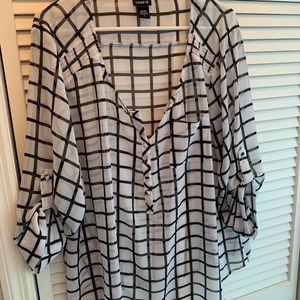Black and white checker blouse.